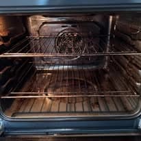 Dirty oven interior before GS Appliance professional cleaning